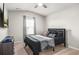 Comfortable bedroom with window seat and neutral decor at 1049 Bodega Loop, Locust Grove, GA 30248