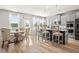 Eat-in kitchen with island, stainless steel appliances, and gray cabinetry at 1049 Bodega Loop, Locust Grove, GA 30248