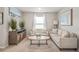 Cozy sitting area perfect for relaxing and entertaining at 1049 Bodega Loop, Locust Grove, GA 30248
