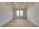 Formal dining room with coffered ceiling and hardwood floors at 238 Arnewood Cir, Mcdonough, GA 30253