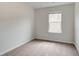 Simple bedroom with neutral walls and carpeted floor at 3218 Bateman Se Dr, Atlanta, GA 30354