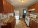 Kitchen with wood cabinets and tile flooring at 2443 Spring Garden Sw Dr, Atlanta, GA 30315