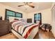 Bright bedroom with hardwood floors and a ceiling fan at 2413 Kennesaw Due West Nw Rd, Kennesaw, GA 30152