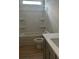 Clean bathroom with a shower/tub combo and quartz countertop at 3046 Zodiac Ct, Lawrenceville, GA 30044