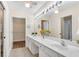 Double vanity bathroom with a large mirror and separate shower at 4022 Vineyards Ln, Kennesaw, GA 30144