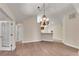 Open dining room with hardwood floors and a chandelier at 4022 Vineyards Ln, Kennesaw, GA 30144