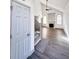 Bright entryway with gray walls, gray flooring, and staircase at 1265 Watercrest Cir, Lawrenceville, GA 30043