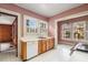 Kitchen with wood cabinets, white countertops, and a dishwasher near the sink at 197 Bolling Rd, Atlanta, GA 30305