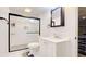 Basement bathroom with white vanity and shower at 775 Stonemill Mnr, Lithonia, GA 30058