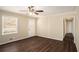 Spacious living room with dark wood-look floors and neutral walls at 896 Meadow Rock Way, Stone Mountain, GA 30083