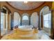 Primary bathroom features a circular tub, walk-in shower, and custom vanity at 595 S Mount Carmel Rd, Mcdonough, GA 30253