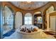 Opulent bathroom with large soaking tub, glass shower, and elegant fixtures at 595 S Mount Carmel Rd, Mcdonough, GA 30253