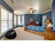 Bright bedroom with a playful atmosphere and built-in drawers at 595 S Mount Carmel Rd, Mcdonough, GA 30253