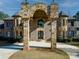 Impressive home entrance with stone archway at 595 S Mount Carmel Rd, Mcdonough, GA 30253