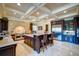Open kitchen with a large island, stainless steel appliances, and custom cabinetry at 595 S Mount Carmel Rd, Mcdonough, GA 30253