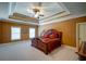Spacious main bedroom with hardwood floors and a large bed at 595 S Mount Carmel Rd, Mcdonough, GA 30253