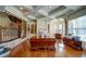 Home office with built-in shelving and hardwood floors at 595 S Mount Carmel Rd, Mcdonough, GA 30253