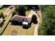 Aerial view of property showcasing house, yard, and driveway at 11790 Brown Bridge Rd, Covington, GA 30016