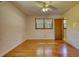 Spacious bedroom with hardwood floors and ample natural light at 11790 Brown Bridge Rd, Covington, GA 30016