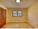 Empty bedroom with carpet, double windows and closet at 11790 Brown Bridge Rd, Covington, GA 30016