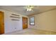 Empty bedroom with carpet, closet, and window at 11790 Brown Bridge Rd, Covington, GA 30016