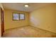Empty bedroom with two windows and closet at 11790 Brown Bridge Rd, Covington, GA 30016
