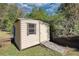 Small storage shed with a ramp and a window at 11790 Brown Bridge Rd, Covington, GA 30016