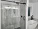 Bathroom with walk-in shower and freestanding bathtub at 195 Burbank Nw Dr, Atlanta, GA 30314