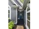 Side entrance with blue door and landscaping at 195 Burbank Nw Dr, Atlanta, GA 30314