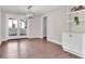 Renovated dining room featuring hardwood floors and a modern chandelier at 2139 Rosebud Rd, Grayson, GA 30017