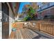 Back deck with wooden railings, table and chairs, offering a relaxing outdoor space at 2750 Cedarbrook Dr, Marietta, GA 30066