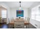 Bright dining room with hardwood floors and a large wooden table at 2750 Cedarbrook Dr, Marietta, GA 30066