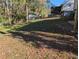 Sloped backyard with a chain link fence at 2496 Shiloh Dr, Decatur, GA 30034