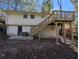 House exterior showcasing a raised deck and stairs at 2496 Shiloh Dr, Decatur, GA 30034