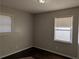 Well-lit bedroom with dark hardwood floors at 2496 Shiloh Dr, Decatur, GA 30034