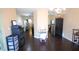 Open concept dining area with dark hardwood floors at 3262 Cascade Parc Sw Blvd, Atlanta, GA 30311