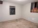 Unfinished bedroom with gray walls and exposed subflooring at 3288 Tarragon Dr, Decatur, GA 30034