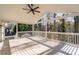 Screened-in porch with wooden deck and ceiling fan at 2010 Drew Valley Ne Rd, Atlanta, GA 30319