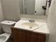 Bathroom with vanity, toilet, and mirror at 125 Belmont Farms Dr, Ellenwood, GA 30294