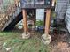 Underside of a wooden deck with concrete block supports at 125 Belmont Farms Dr, Ellenwood, GA 30294