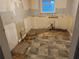 Kitchen under renovation, showing exposed plumbing and subflooring at 125 Belmont Farms Dr, Ellenwood, GA 30294
