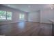 Open living area with hardwood floors and abundant natural light at 4694 E Glen Ridge E Cir, Winston, GA 30187