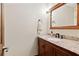 Modern bathroom with granite countertop and wood vanity at 5224 Deering Trl, Marietta, GA 30068