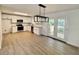 Modern kitchen with white cabinets, granite countertops, and stainless steel appliances at 1039 Cedar Cir, Forest Park, GA 30297