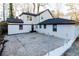 Rear view of the house, showcasing the back patio and additional structure at 2531 Midway Rd, Decatur, GA 30030