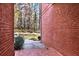 Brick walkway between two brick walls, leading to backyard at 271 Brooks Rackley Rd, Dallas, GA 30157