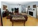 Large living room with hardwood floors and multiple seating areas at 3554 Umatilla Sw Ln, South Fulton, GA 30331