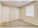 Bright bedroom with neutral carpeting and double closets at 1101 White Oak Sw Ave, Atlanta, GA 30310