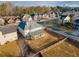 Aerial view of the home's back elevation, highlighting the large backyard and patio at 5315 Hopewell Manor Dr, Cumming, GA 30028