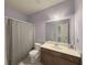 Bathroom boasts a vanity, toilet, and shower at 5315 Hopewell Manor Dr, Cumming, GA 30028